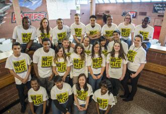 Group of students wearing no place for hate shirts